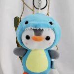 Pinguino Disfrazado de Dinosaurio